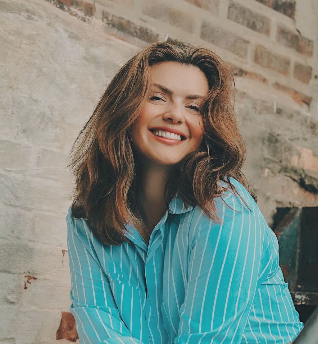 Travel and lifestyle blogger showing empaths and neurodivergent creatives how to turn wanderlust into work. Shares aligned routines, mindful travel, and content creation tips for soft living and location freedom.